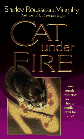 Cat under Fire A Joe Grey Mystery  1998 9780061056017 Front Cover