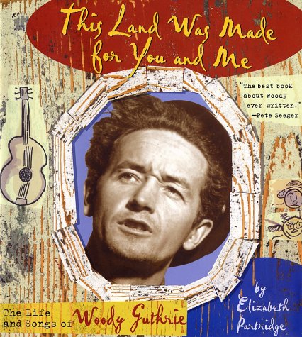 This Land Was Made for You and Me The Life and Songs of Woody Guthrie  2001 9780670035359 Front Cover