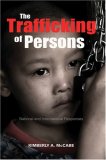 Trafficking of Persons National and International Responses cover art