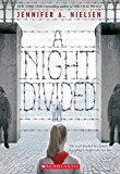 Night Divided (Scholastic Gold)  9780545682442 Front Cover