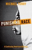Punishing Race A Continuing American Dilemma 2012 9780199926466 Front Cover