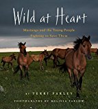 Wild at Heart Mustangs and the Young People Fighting to Save Them  9780544392946 Front Cover